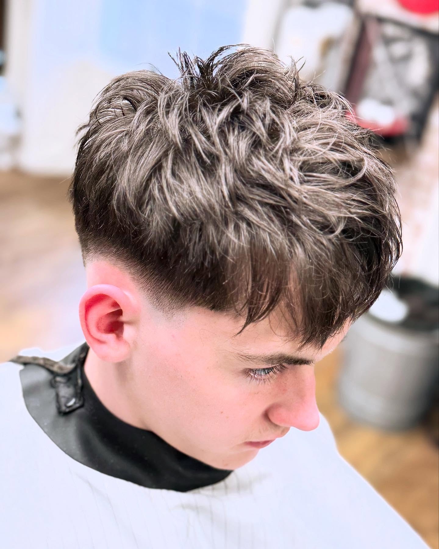 Textured French crop with a low fade