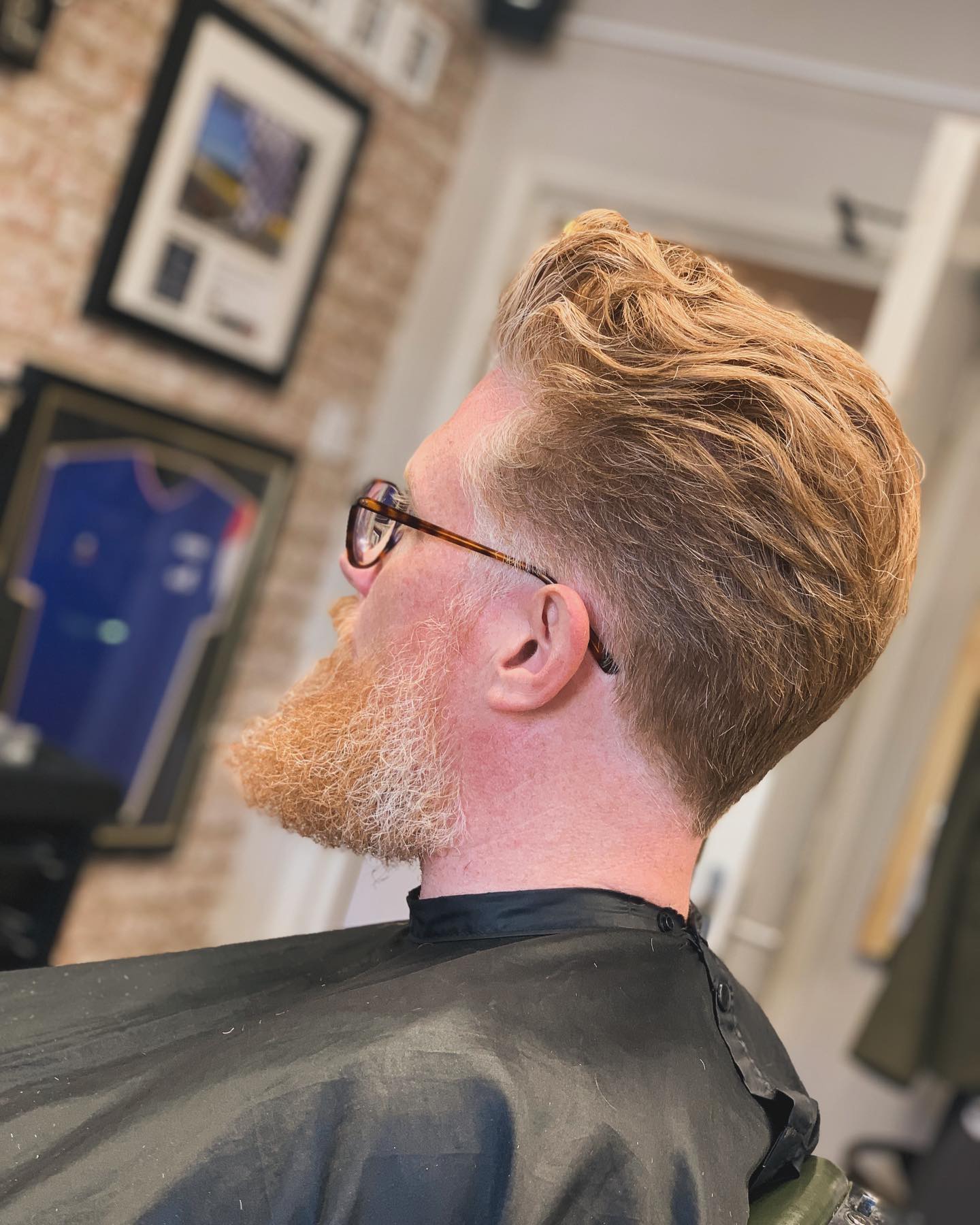 Textured cut with a full ginger beard