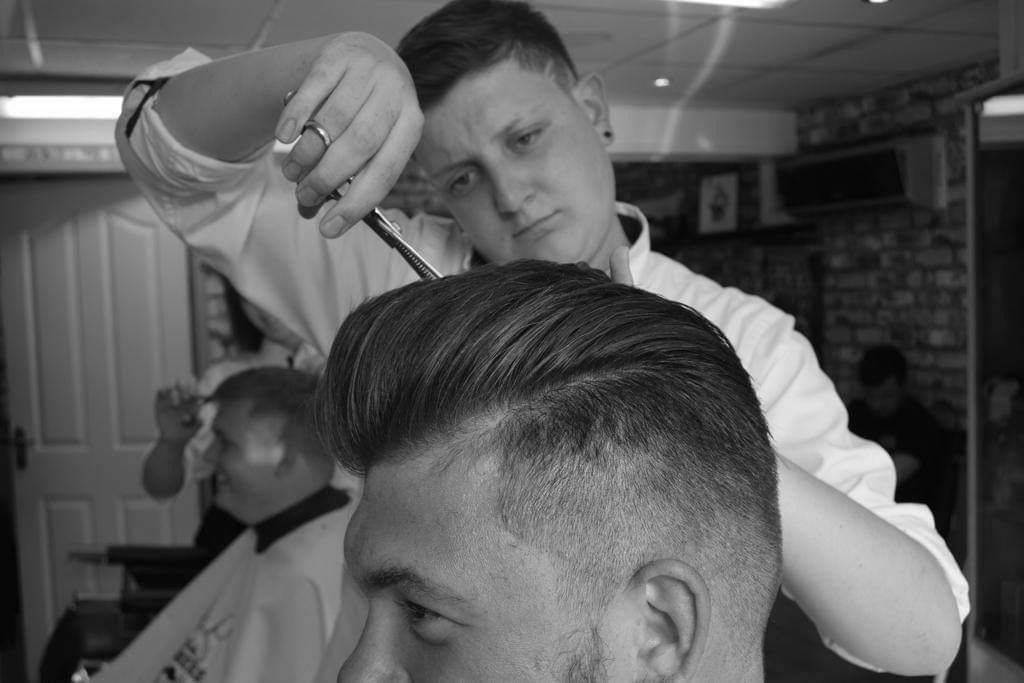 Styling a quiff with clippers and comb